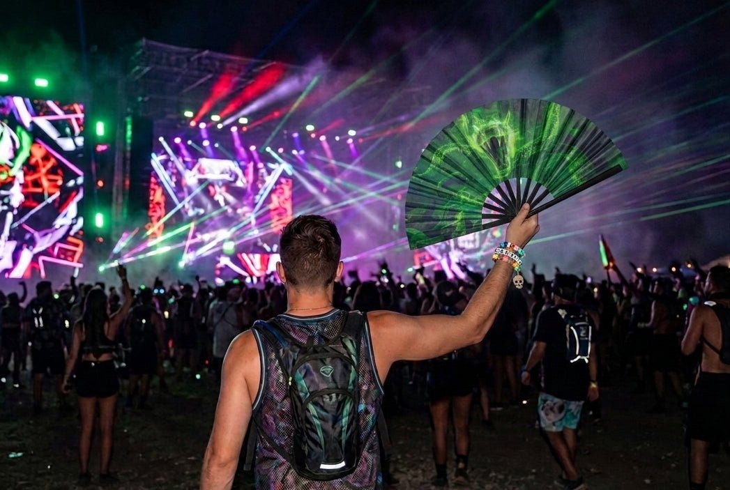UV reactive rave fan clacking at an EDM dance floor